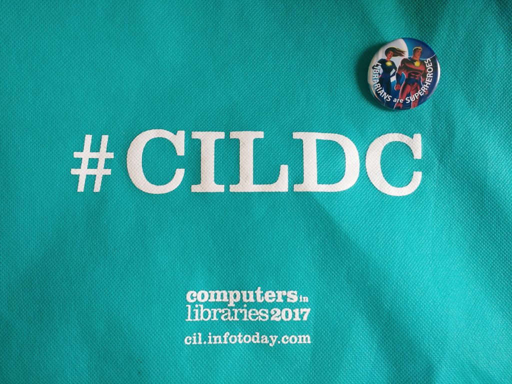 CILDC tote bag with "Librarians are Superheroes" pin